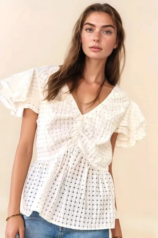 Davi & Dani Shirring V-Neck Ruffle Gingham Plaid Printed Top sold by Charming Charlie