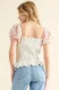 And The Why Embellishment Sleeve Smocked Top sold by Charming Charlie