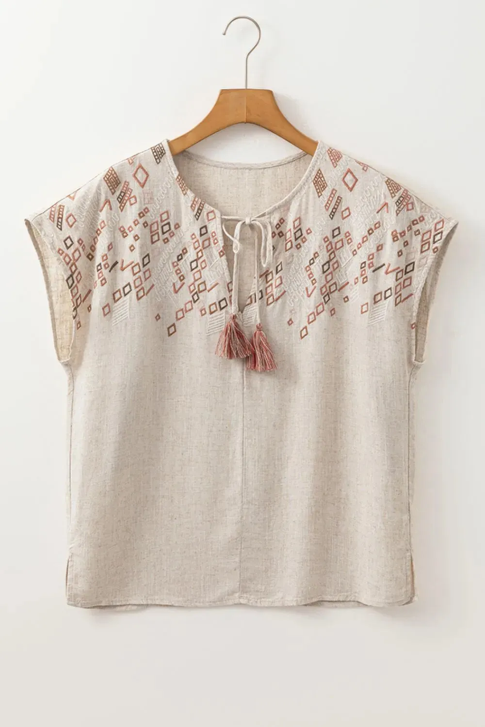 Geometric Embroidered Short Sleeve Tassel Tie Neck Blouse sold by Charming Charlie product image thumbnail 5