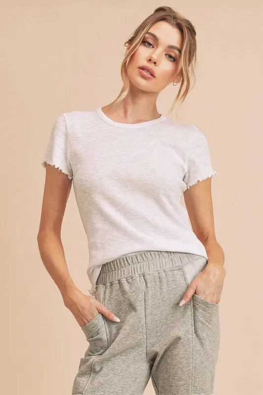 Aemi+Co Round Neck Lettuce Hem Short Sleeve T-Shirt sold by Charming Charlie