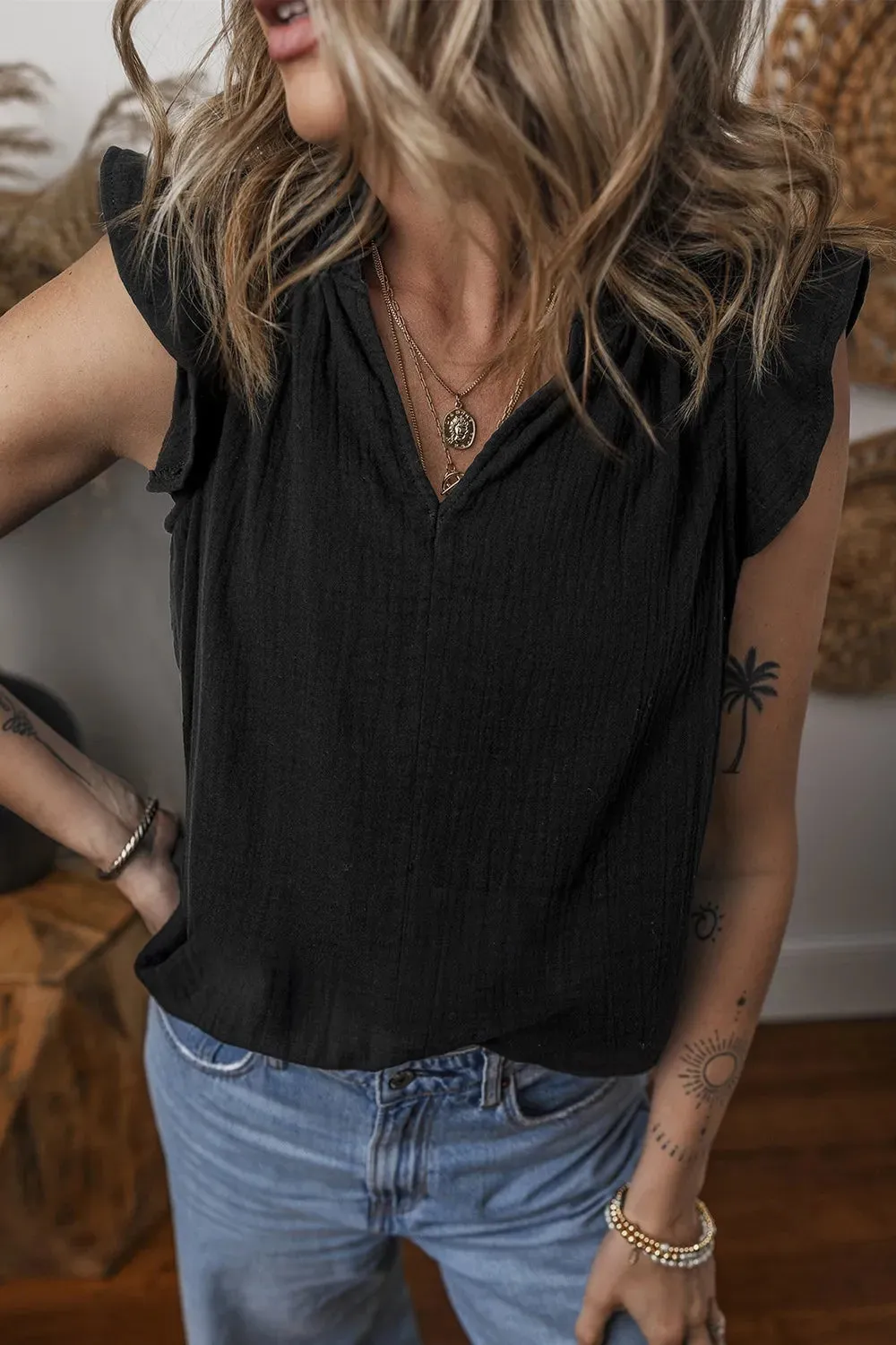 Ruffled Shoulder Notched Shift Tank Top sold by Charming Charlie