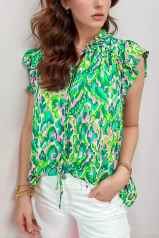 Abstract Print Ruffled Trim Tie Neck Top sold by Charming Charlie