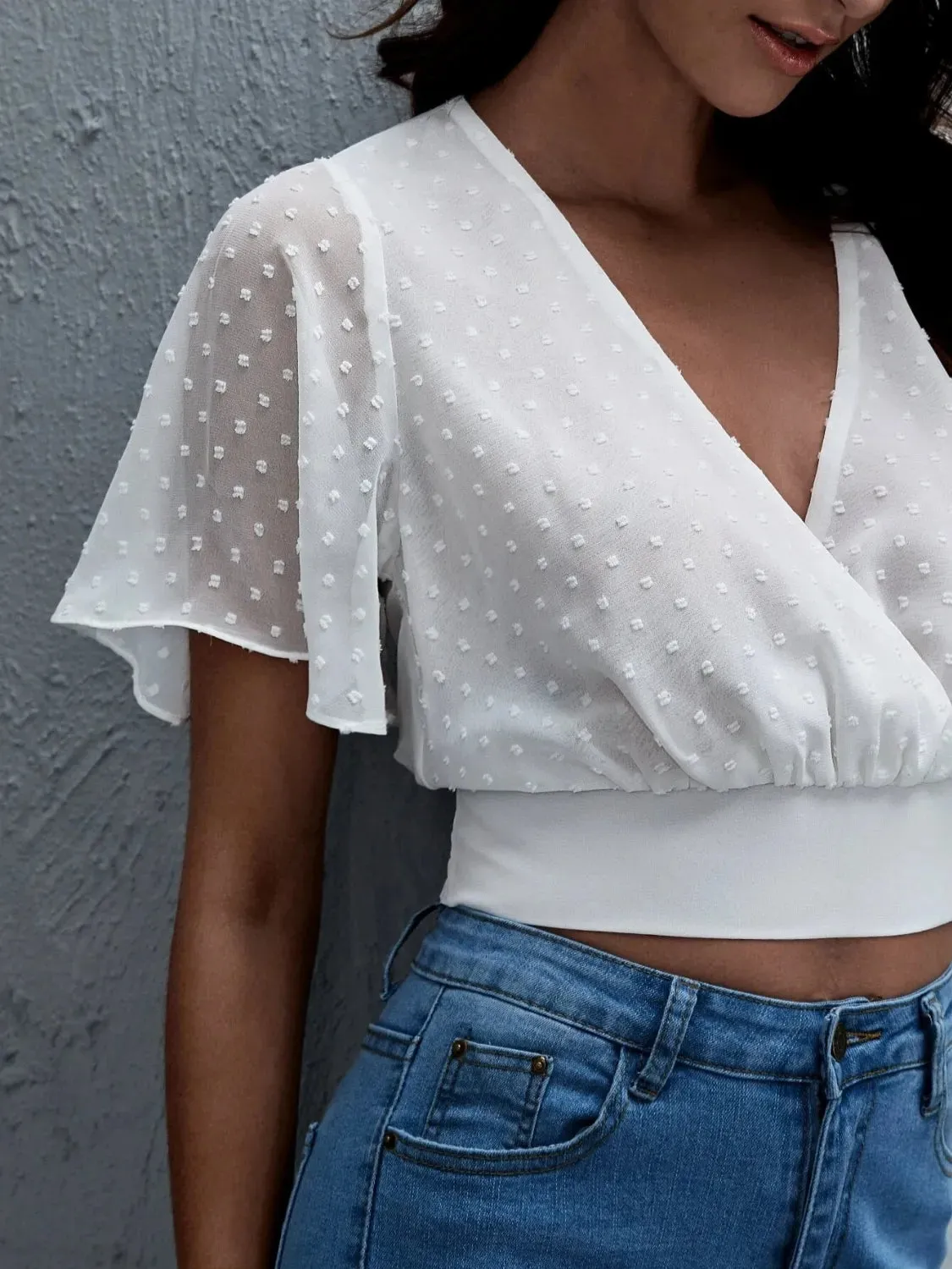 Short Sleeve Smocked Swiss Dot Blouse sold by Charming Charlie product image thumbnail 4