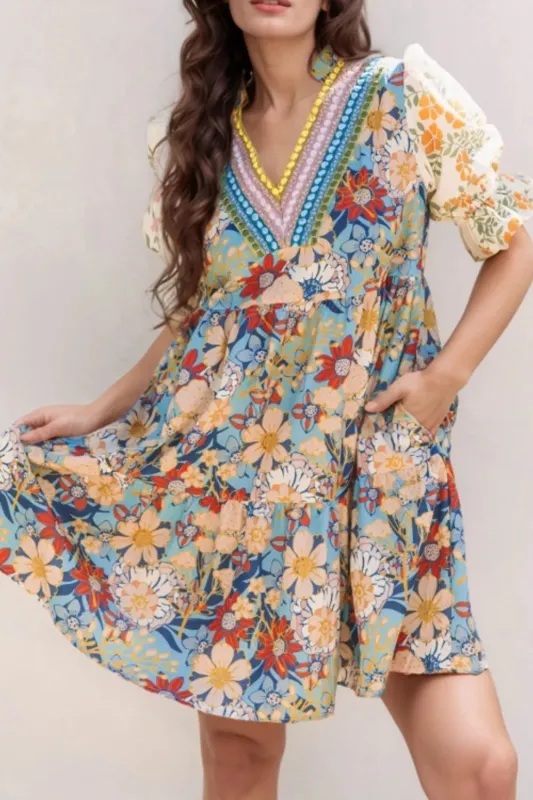 Printed Notched Flounce Sleeve Mini Dress sold by Charming Charlie