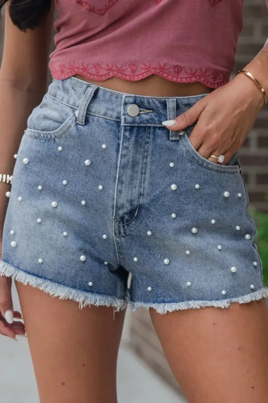 Pearl Beaded Raw Hem Wash Denim Shorts sold by Charming Charlie