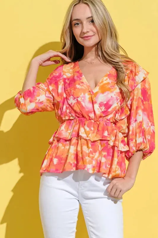 And The Why Ruffled Printed Puff Sleeve Blouse sold by Charming Charlie