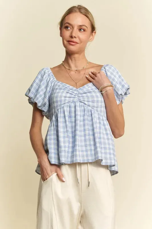 Davi & Dani Plaid Puff Sleeves Ruffled Smocked Blouse sold by Charming Charlie product image thumbnail 5