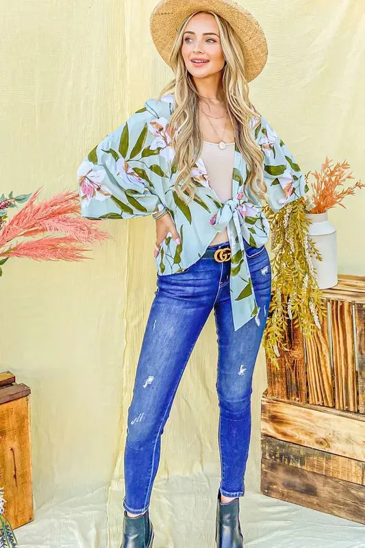 And The Why Front Tie Knot Floral Print Top sold by Charming Charlie