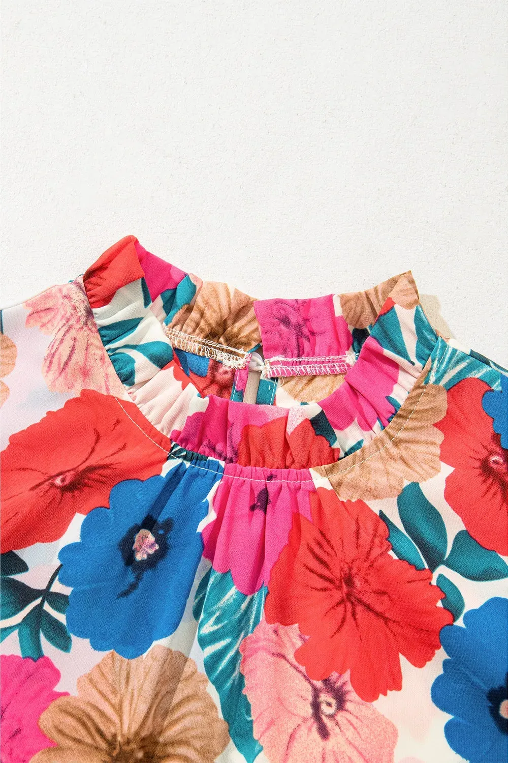 Floral Mock Neck Striped Cap Sleeve Blouse sold by Charming Charlie product image thumbnail 5