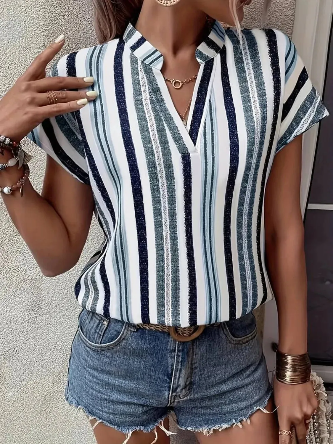 Striped Notched Short Sleeve Shirt sold by Charming Charlie