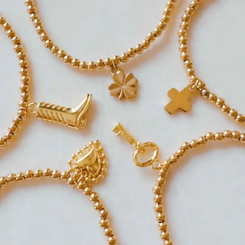 Golden Ball Single Charm Stretch Bracelet sold by Charming Charlie