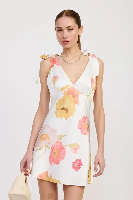 SHOULDER BOWTIE MINI DRESS sold by Charming Charlie