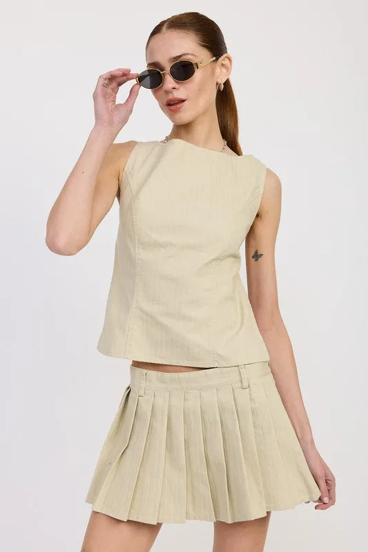 BACKLESS RIDER TOP sold by Charming Charlie