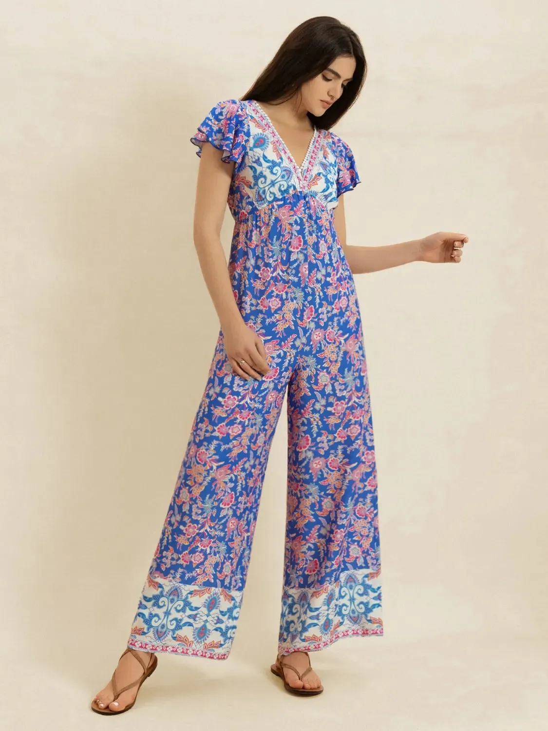Printed V-Neck Wide Leg Jumpsuit sold by Charming Charlie product image thumbnail 5