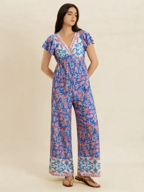 Printed V-Neck Wide Leg Jumpsuit sold by Charming Charlie