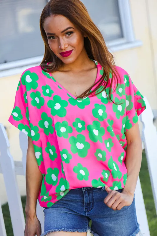 Spring Vibes Pink & Green Flower Print V Neck Short Sleeve Top sold by Charming Charlie