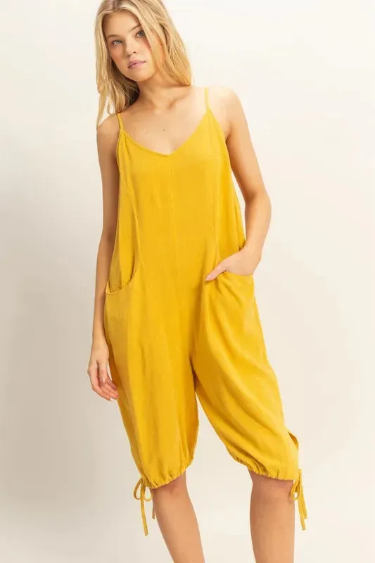 HYFVE V-Neck Pocket Detail Side Tie Hem Romper sold by Charming Charlie