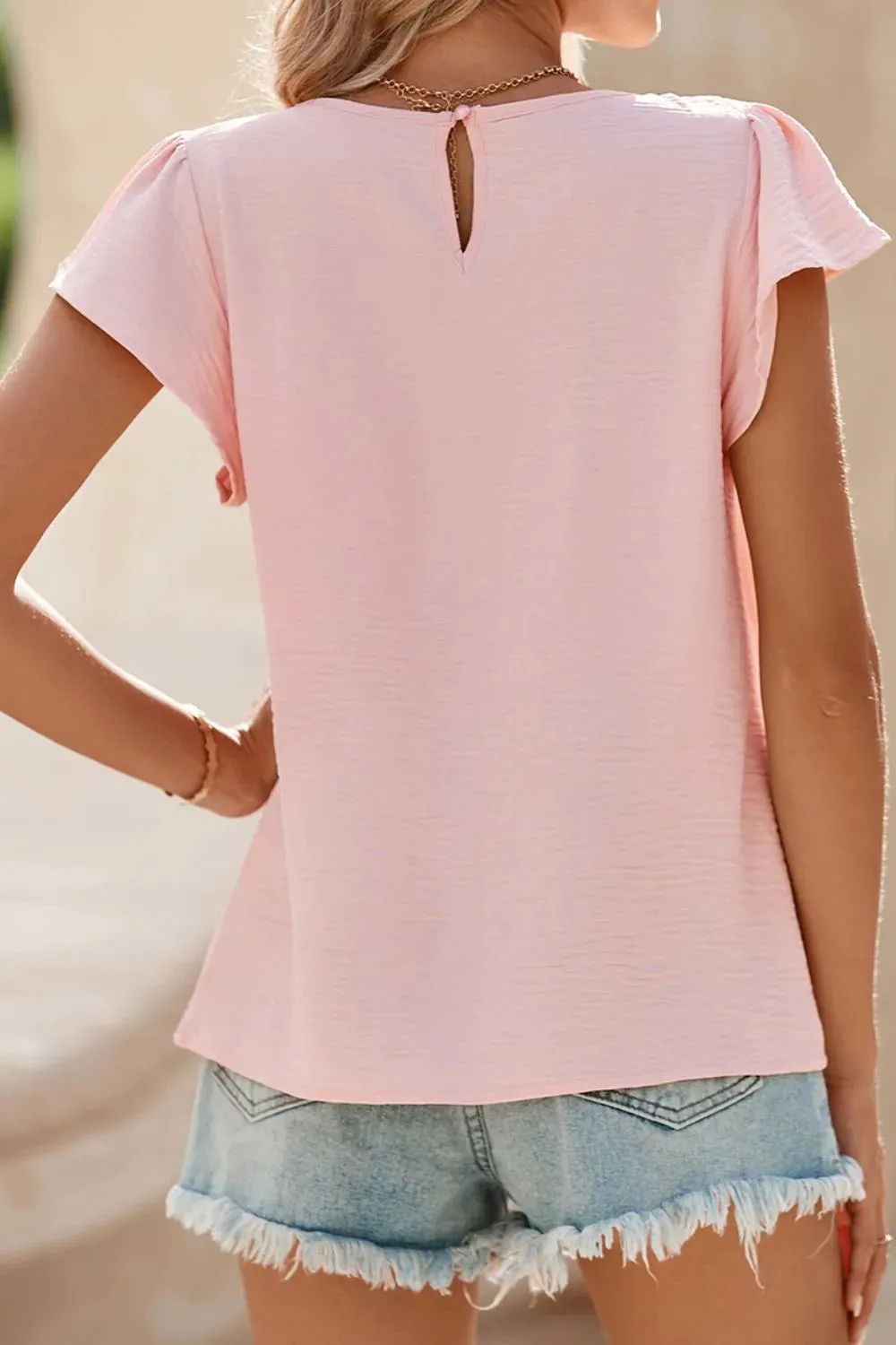 Solid Color Flounce Sleeve Pleated Round Neck Blouse sold by Charming Charlie product image thumbnail 3