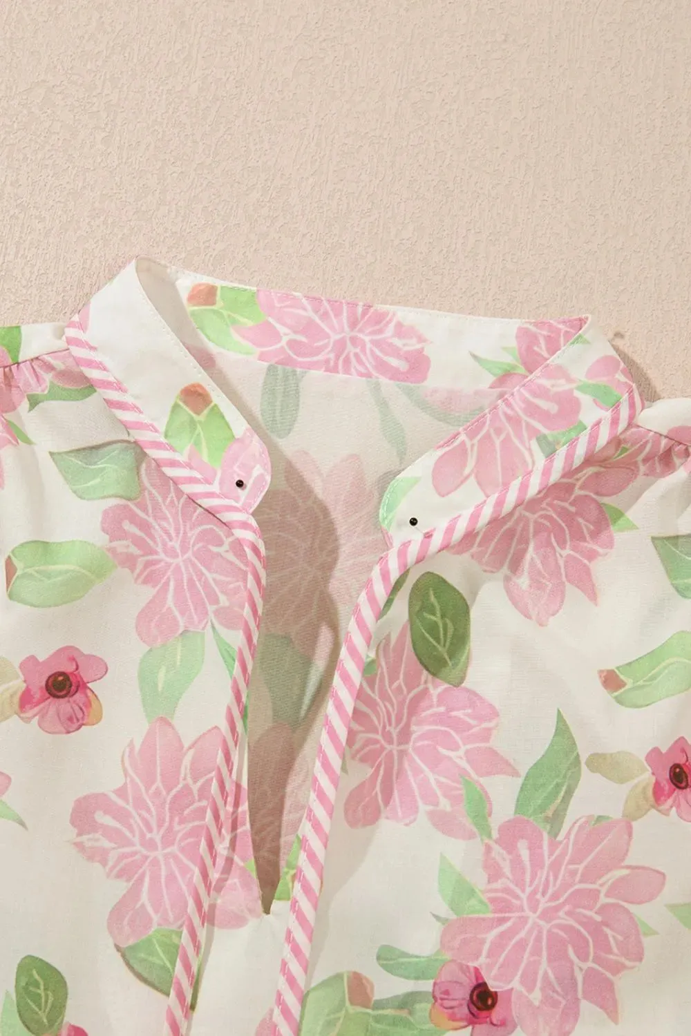 Printed Tie Neck Short Sleeve Blouse sold by Charming Charlie product image thumbnail 4