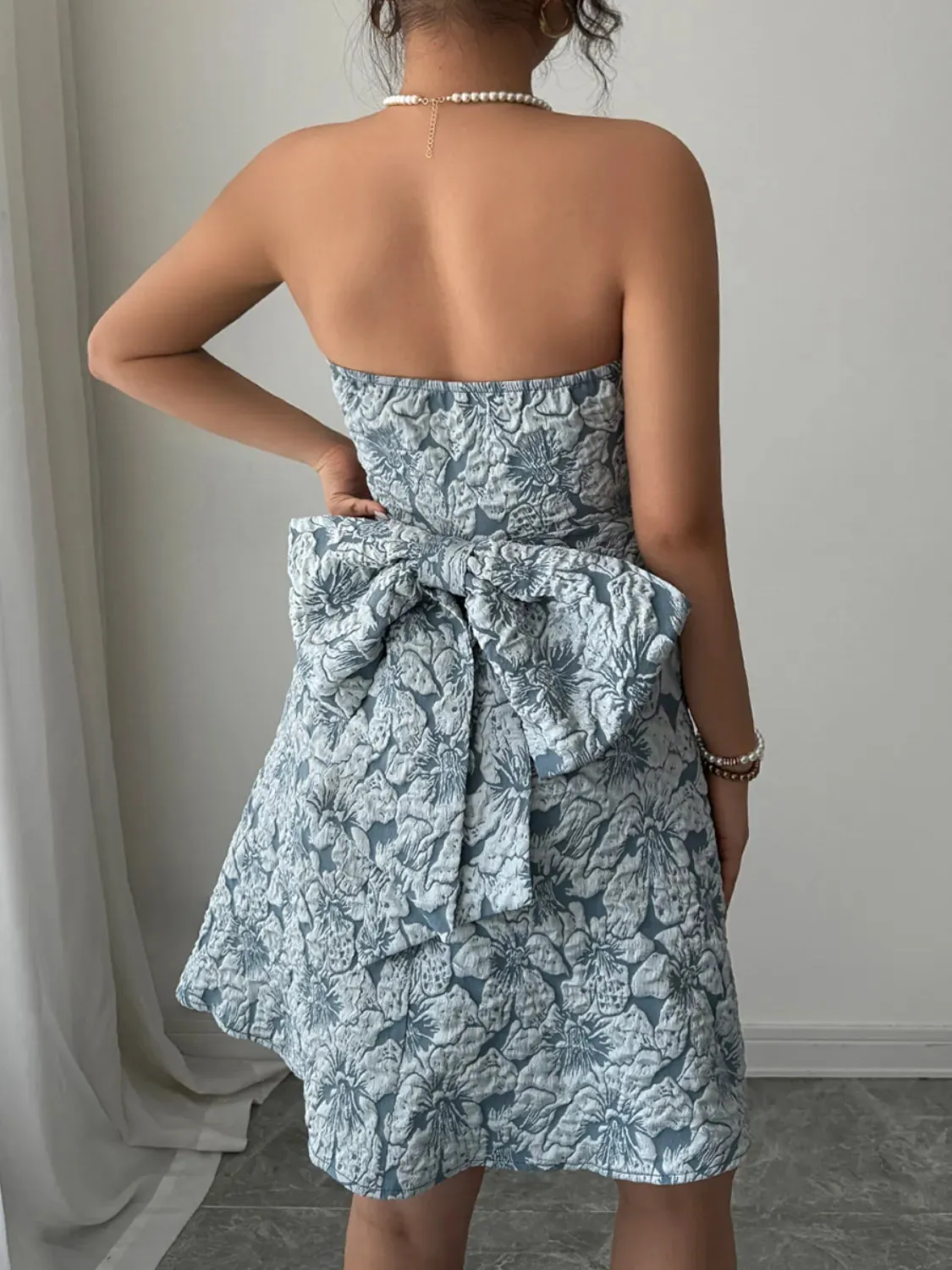 Bow Back Tube Mini Dress sold by Charming Charlie