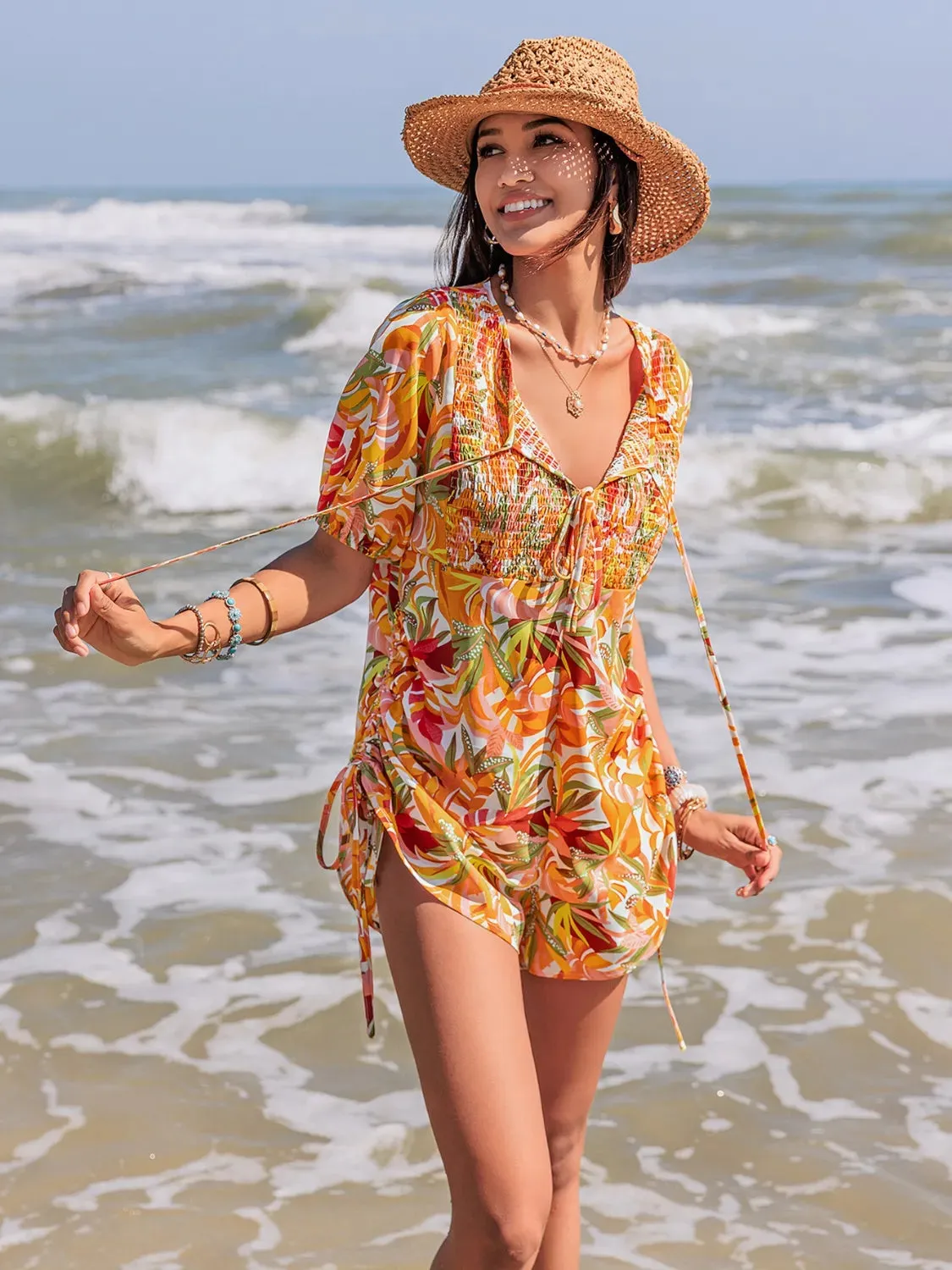 Smocked Printed Tie Neck Romper sold by Charming Charlie product image thumbnail 2