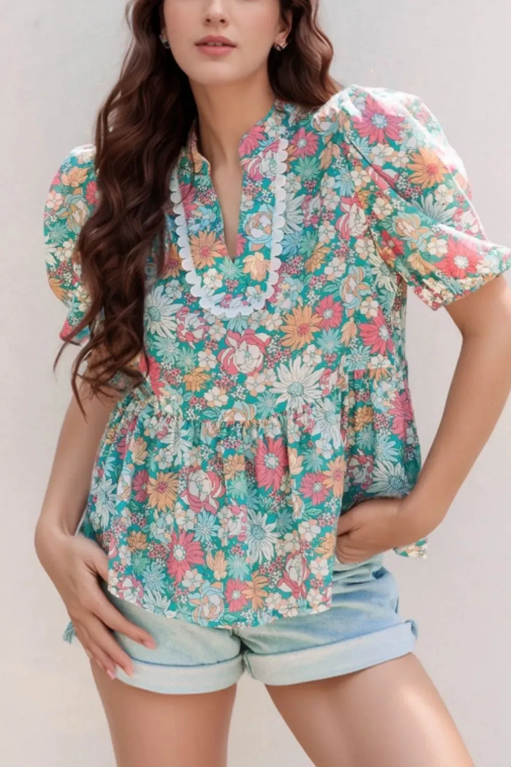 Multicolour Notched Neck Puff Short Sleeve Floral Blouse sold by Charming Charlie