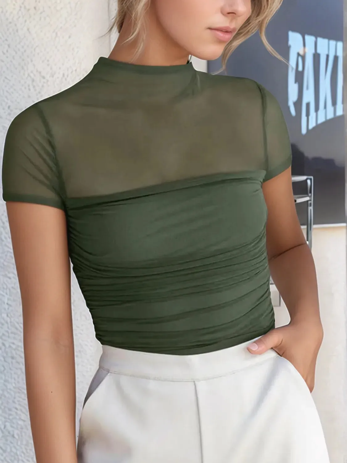 Mesh Mock Neck Short Sleeve T-Shirt sold by Charming Charlie