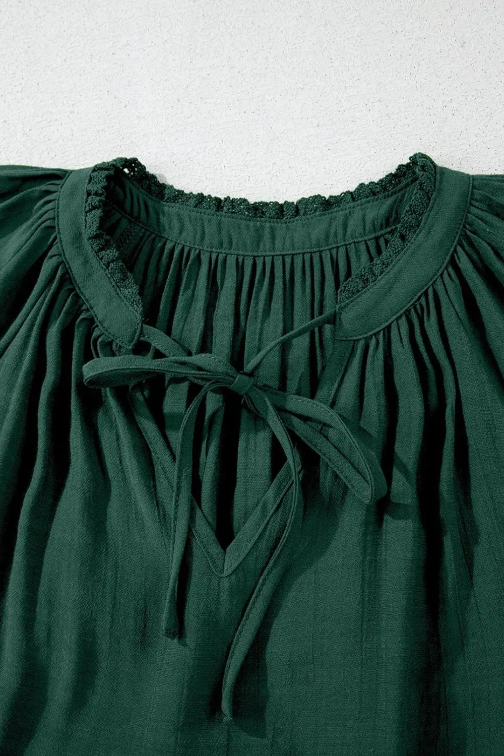 Eyelet Embroidered Sleeve Tie Neck Blouse sold by Charming Charlie product image thumbnail 5