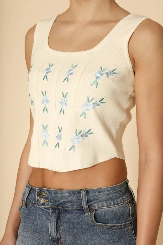 Floral corset tank top sold by Charming Charlie