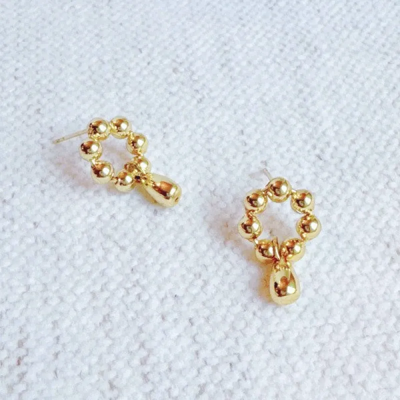 Golden Ball Petal Drop Earrings sold by Charming Charlie