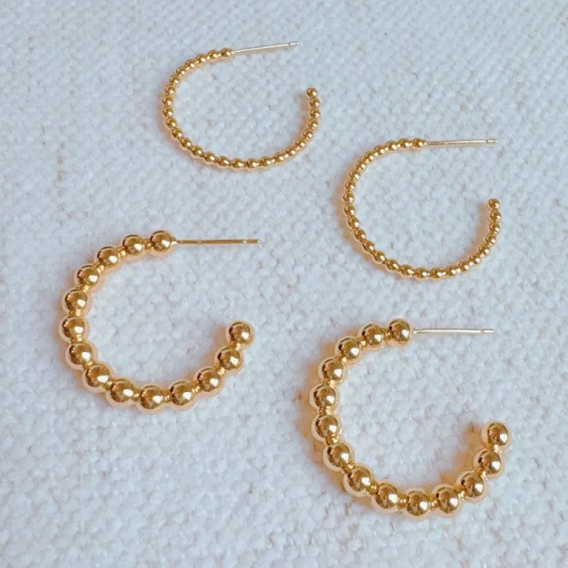 Golden Dot Everyday Hoop Earrings sold by Charming Charlie