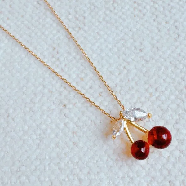 Jewel Cherry Pendant Necklace sold by Charming Charlie