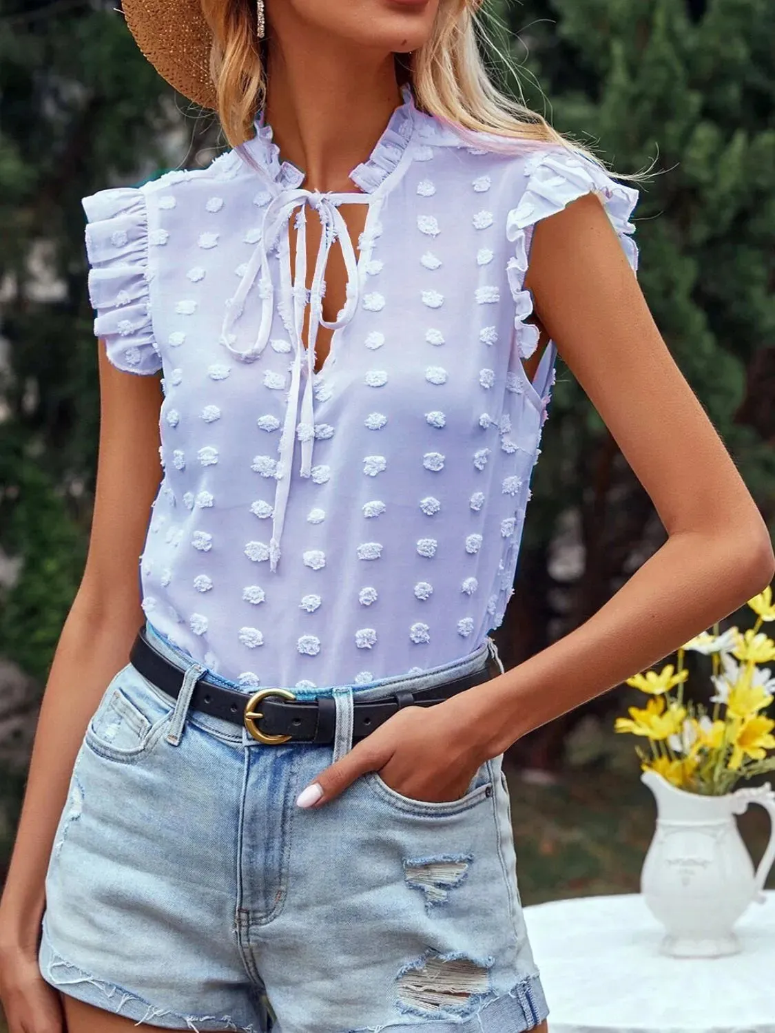 Frill Tie Neck Cap Sleeve Blouse sold by Charming Charlie