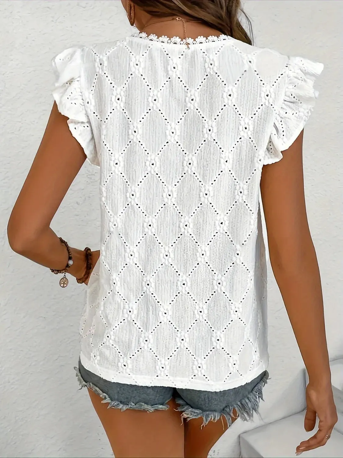 Ruffled Eyelet V-Neck Cap Sleeve Blouse sold by Charming Charlie product image thumbnail 2