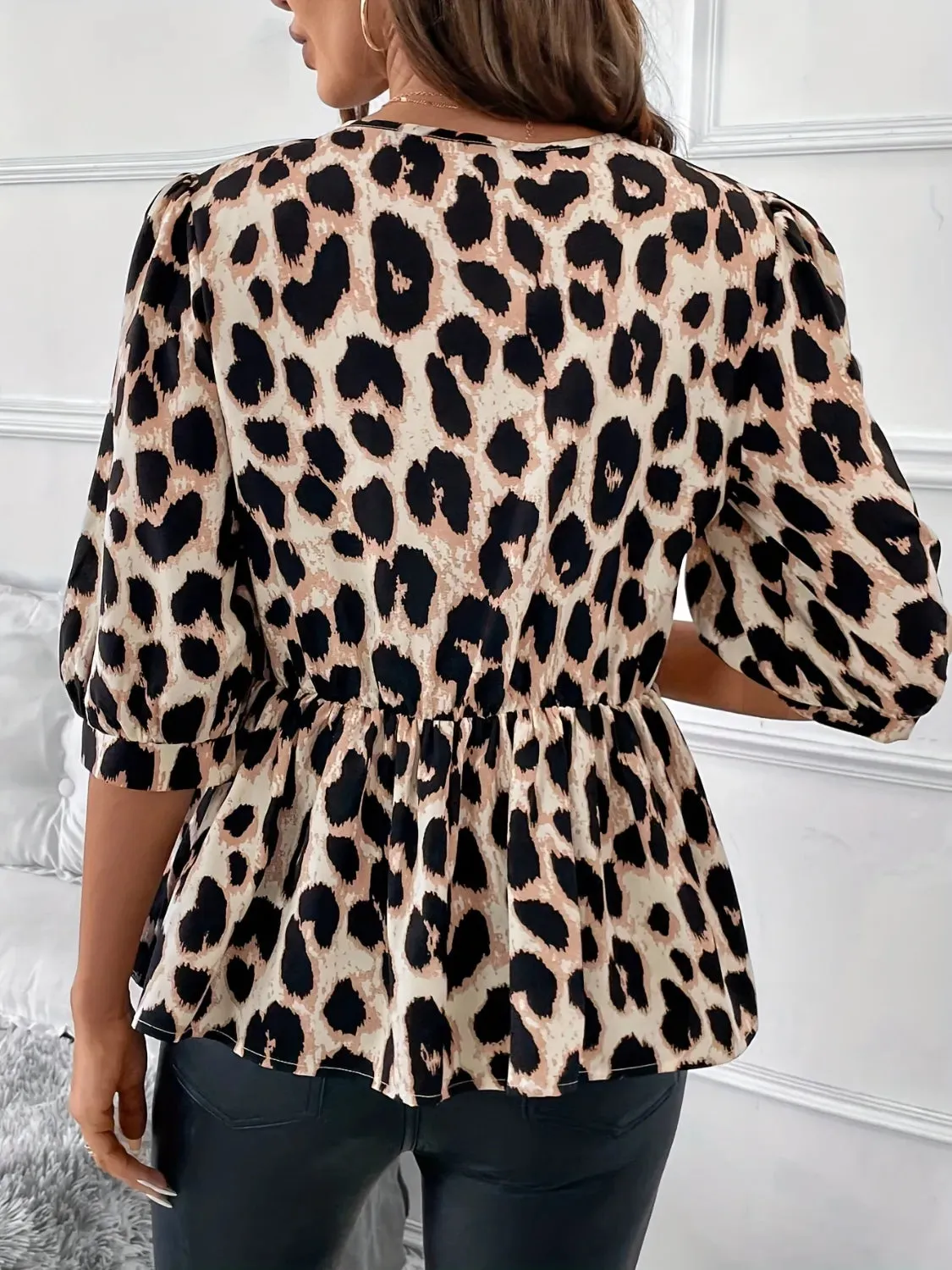 Tied Leopard Round Neck Half Sleeve Blouse sold by Charming Charlie product image thumbnail 2
