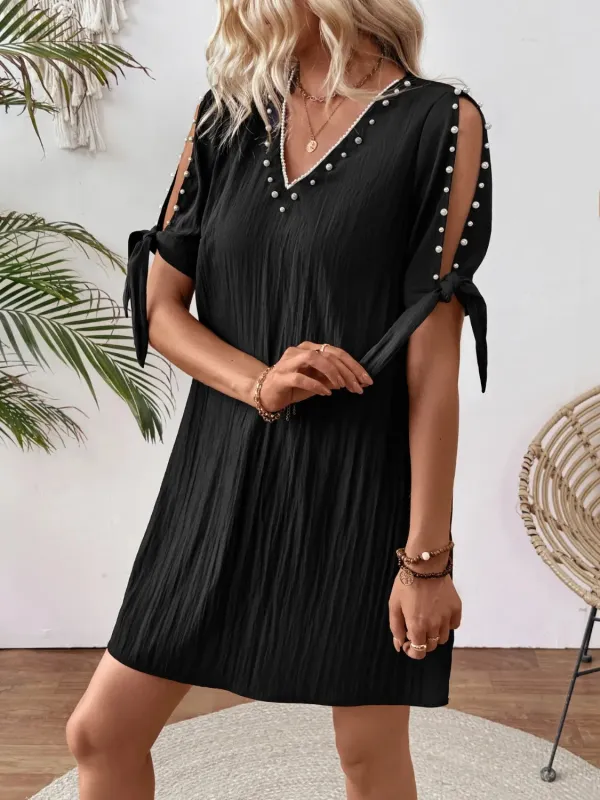 Cutout Pearl Detail V-Neck Mini Dress sold by Charming Charlie