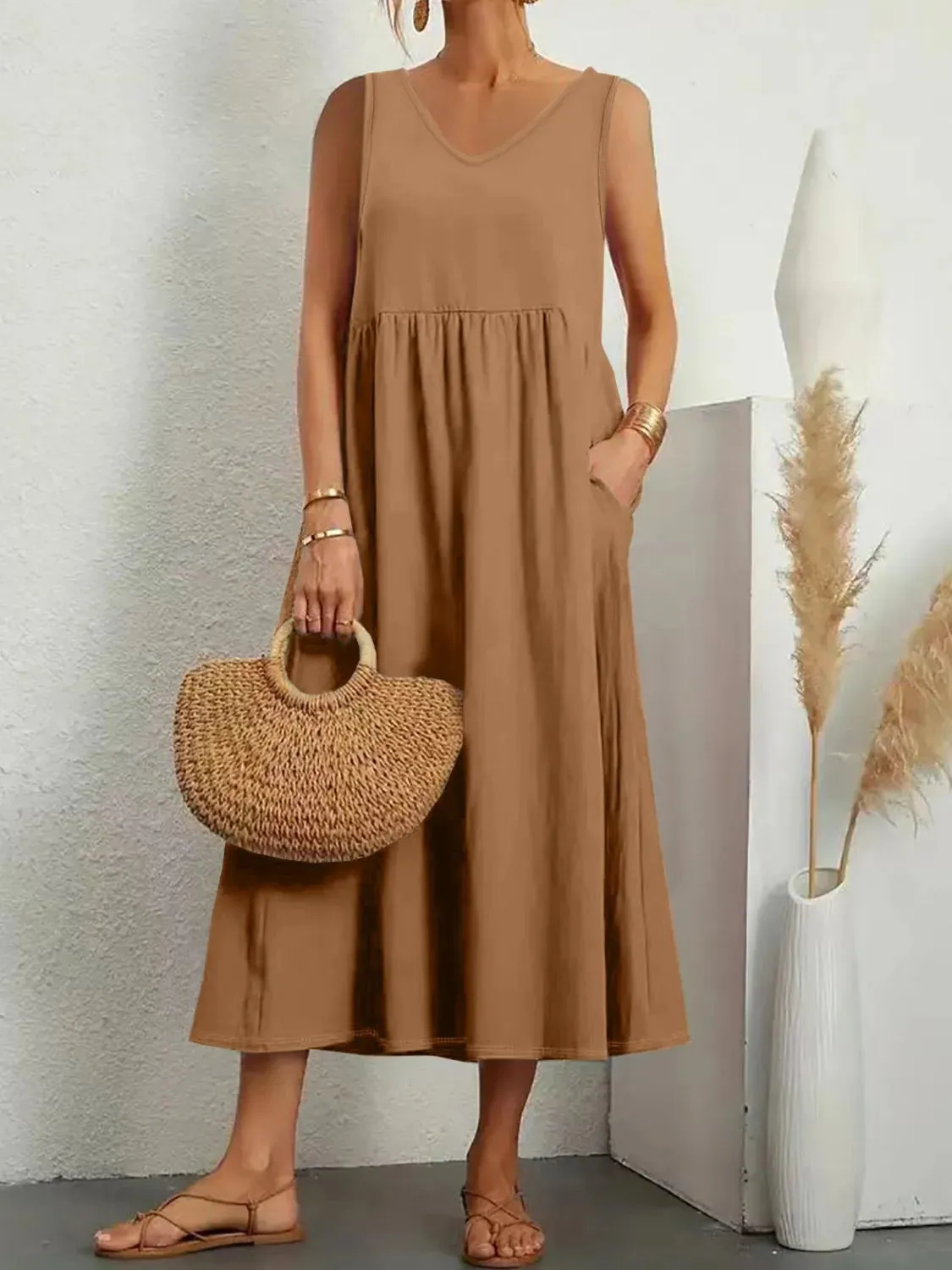 Full Size V-Neck Sleeveless Dress with Pockets Plus Size sold by Charming Charlie