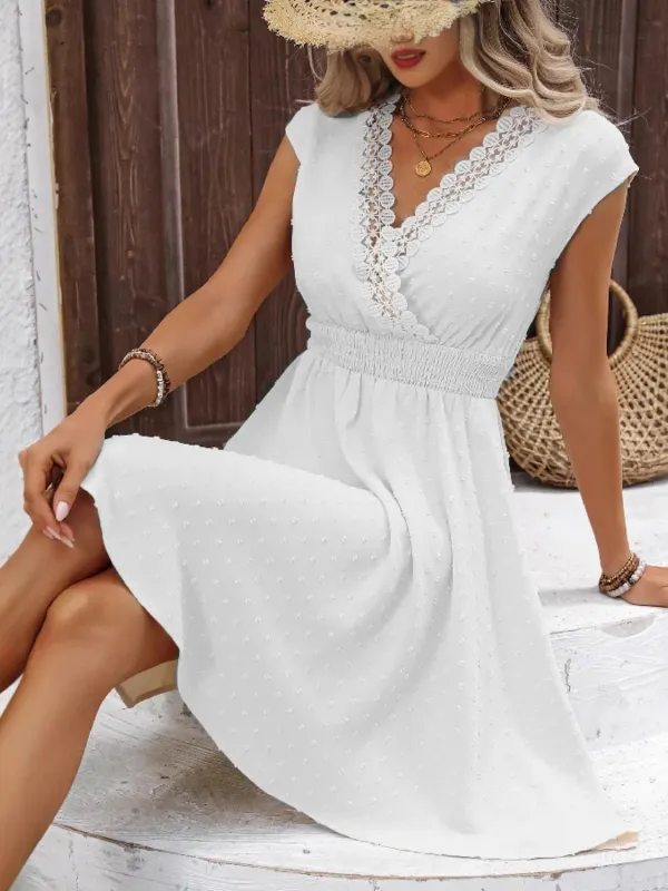 Swiss Dot Surplice Cap Sleeve Mini Dress sold by Charming Charlie