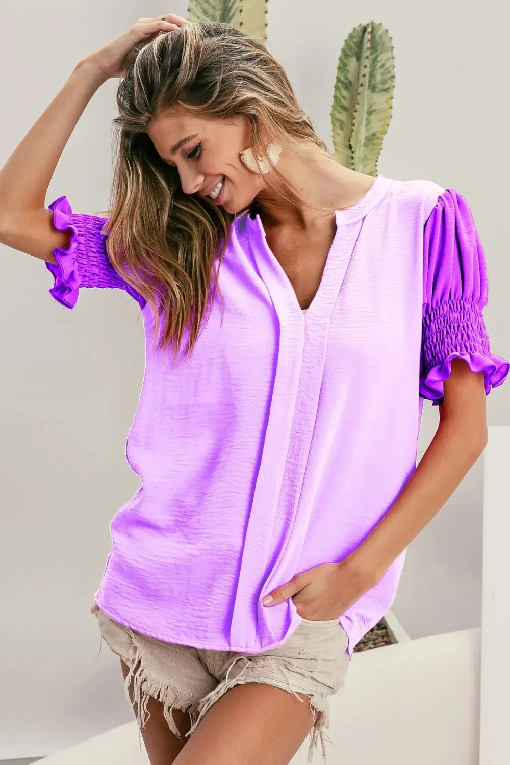 BiBi Air Flow Color Block Puff Sleeves V Neck Top sold by Charming Charlie
