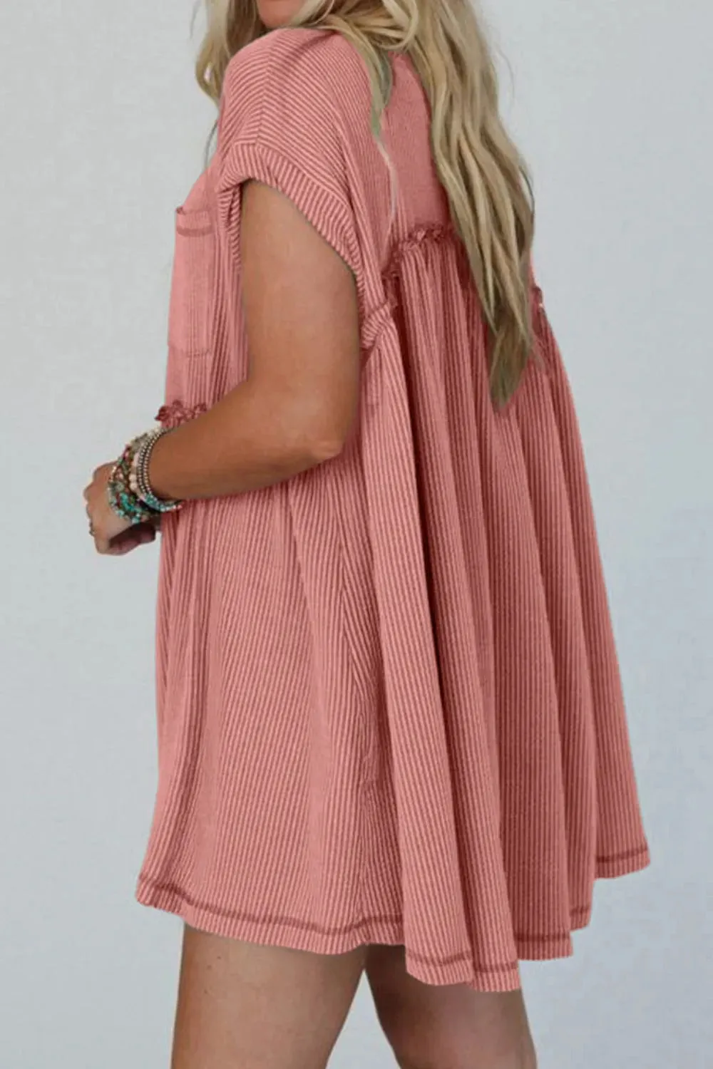 Corded Knit Textured Patched Pocket Frilled Swing Mini Dress with Pockets sold by Charming Charlie product image thumbnail 5