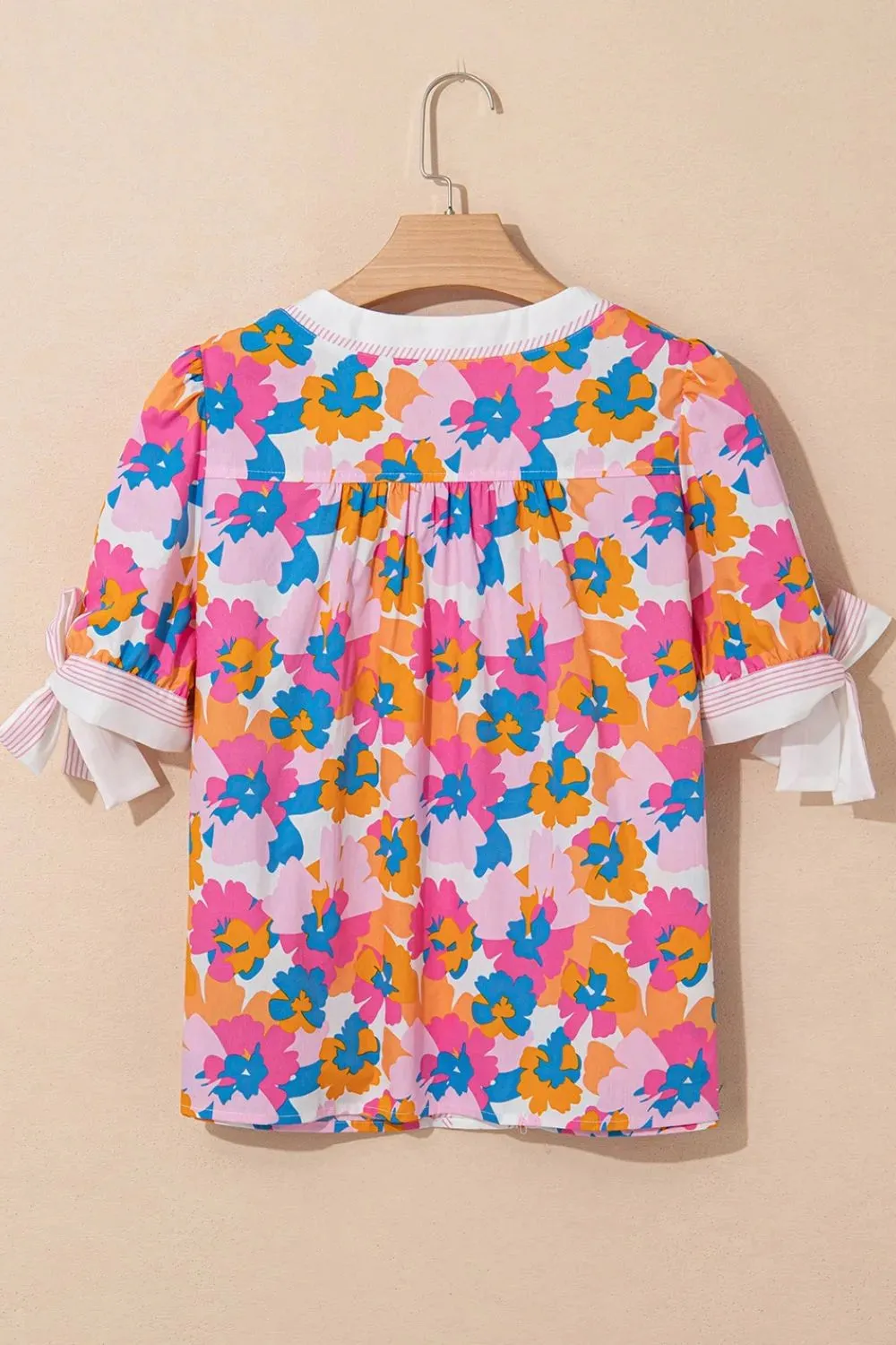 Floral Striped Edge V Neck Knotted Short Sleeve Blouse sold by Charming Charlie product image thumbnail 5