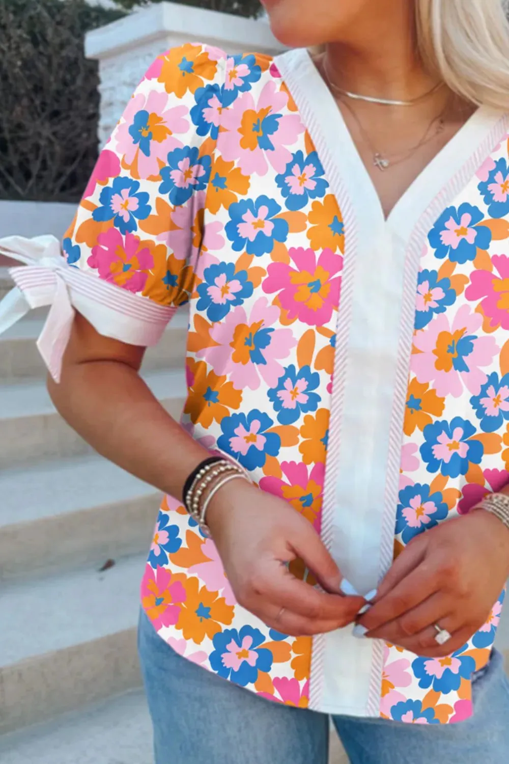 Floral Striped Edge V Neck Knotted Short Sleeve Blouse sold by Charming Charlie product image thumbnail 2