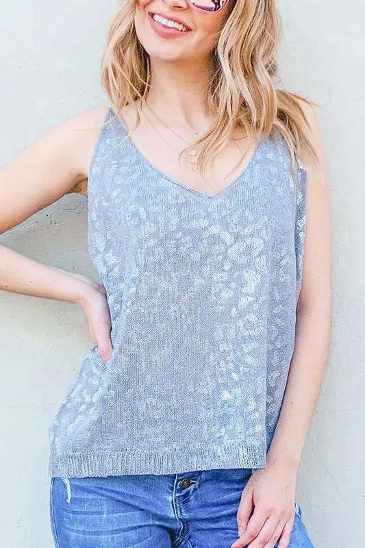 And The Why Leopard Foil Print Sleeveless Sweater Top sold by Charming Charlie