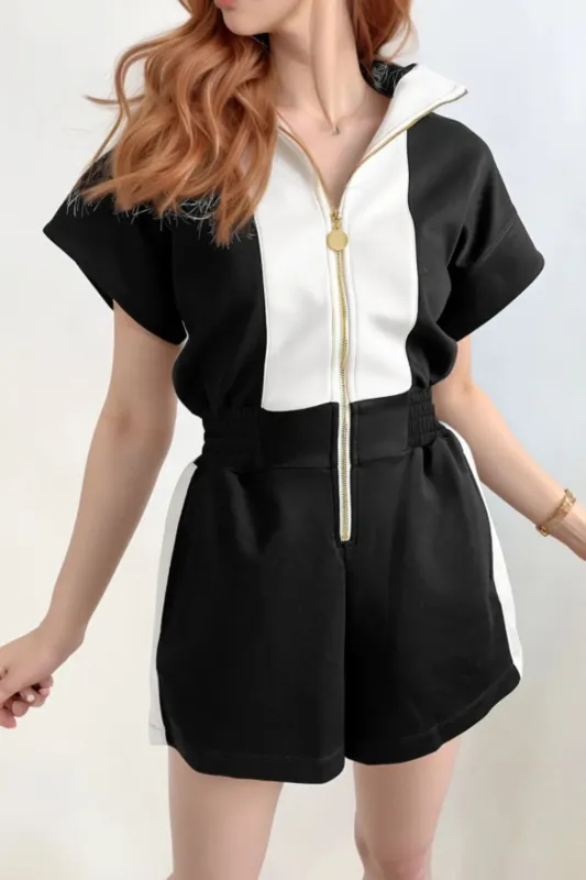 Half Zip Short Sleeve Romper sold by Charming Charlie