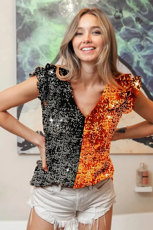 BiBi Game Day Color Block Sequin Ruffled Armhole Top sold by Charming Charlie