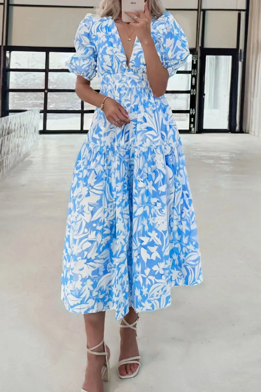 Floral V Neck Puff Short Sleeve Flowy Dress sold by Charming Charlie