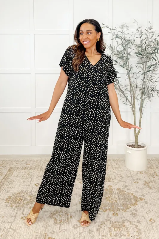 Jasmine Jumpsuit Blossoms sold by Charming Charlie