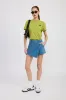 WRAPPED ASYMMETRICAL DENIM SKIRT sold by Charming Charlie