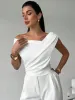 Asymmetrical Ruched Short Sleeve Top sold by Charming Charlie