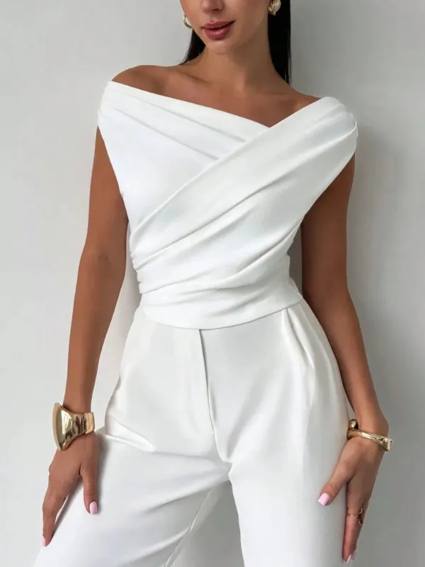 Asymmetrical Ruched Short Sleeve Top sold by Charming Charlie